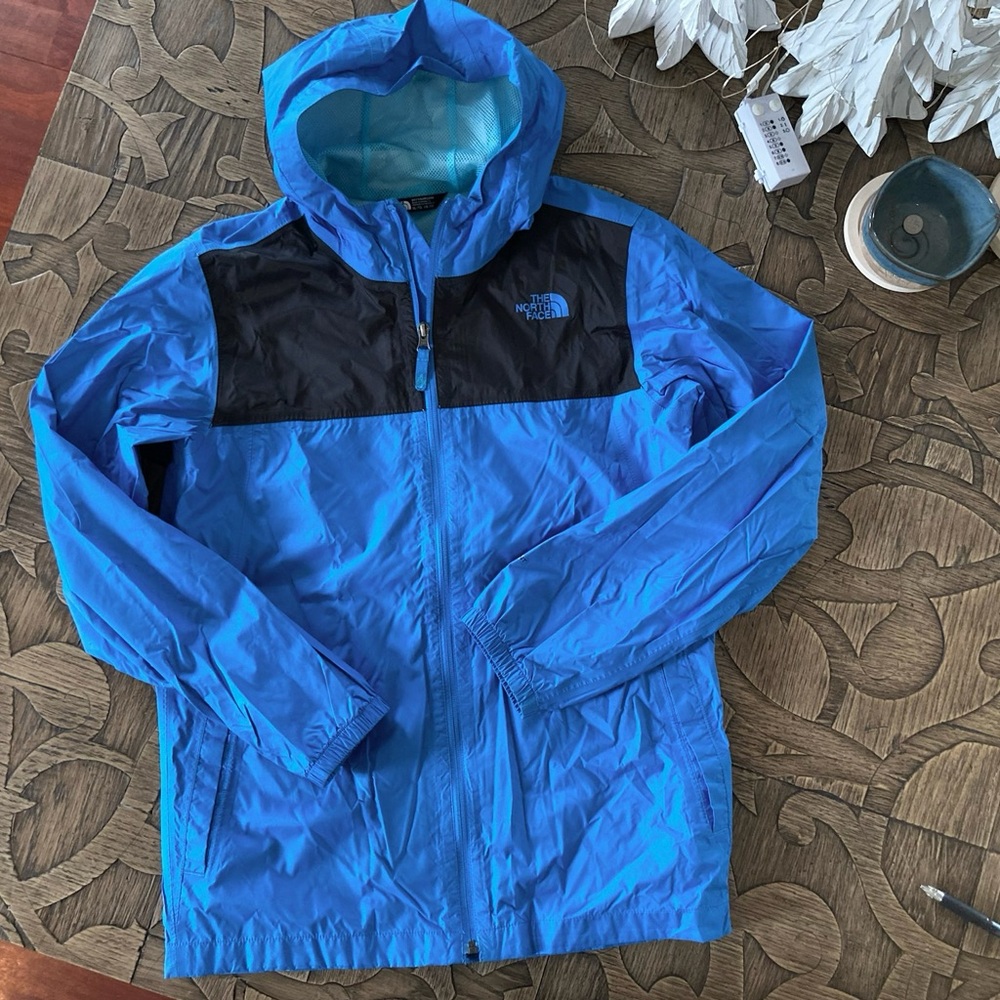 The North Face rain or wind coat. boys XL women small
